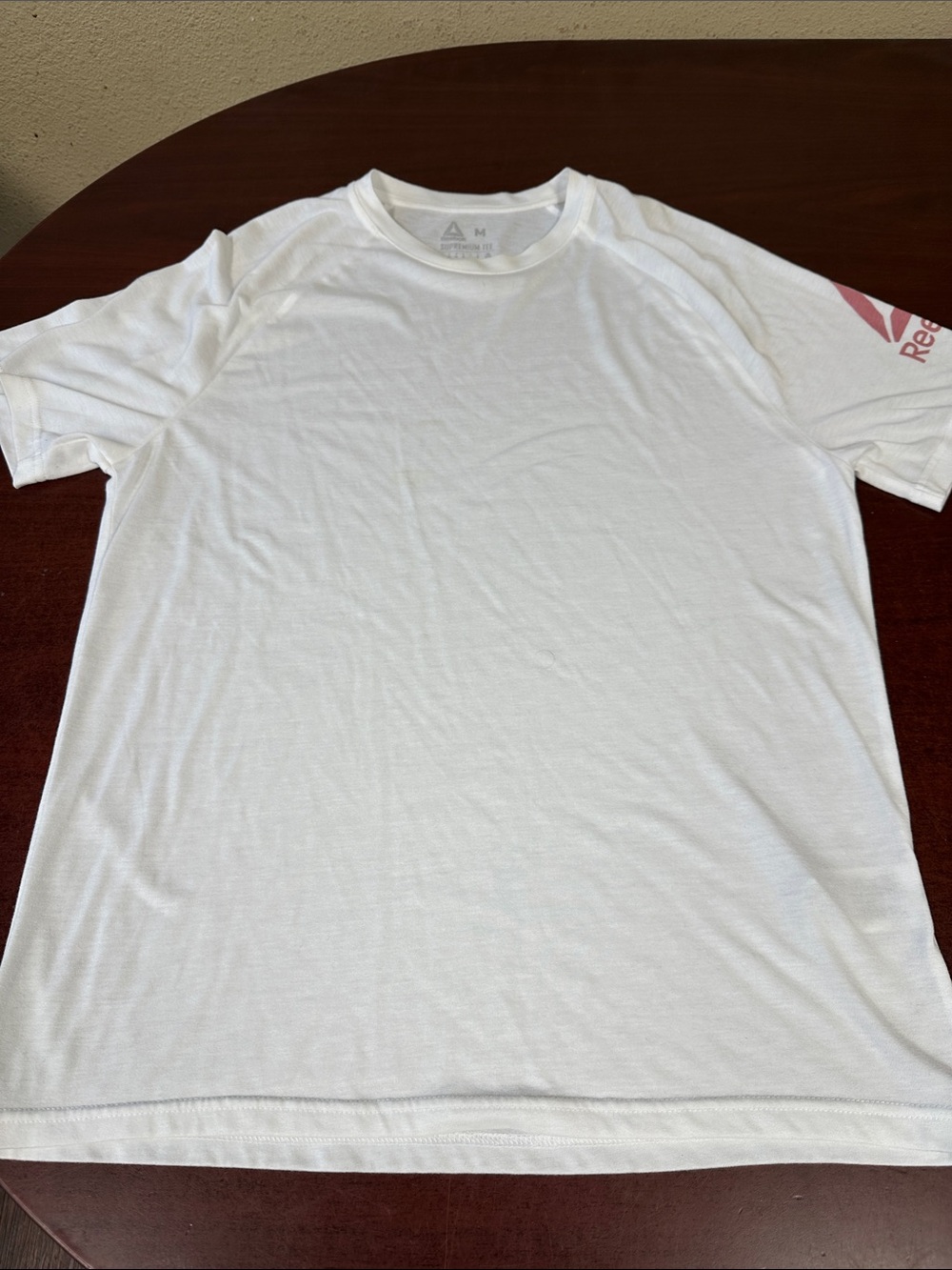 Reebok White Short Sleeve Athletic Crew Tee with Pink Logo Accent